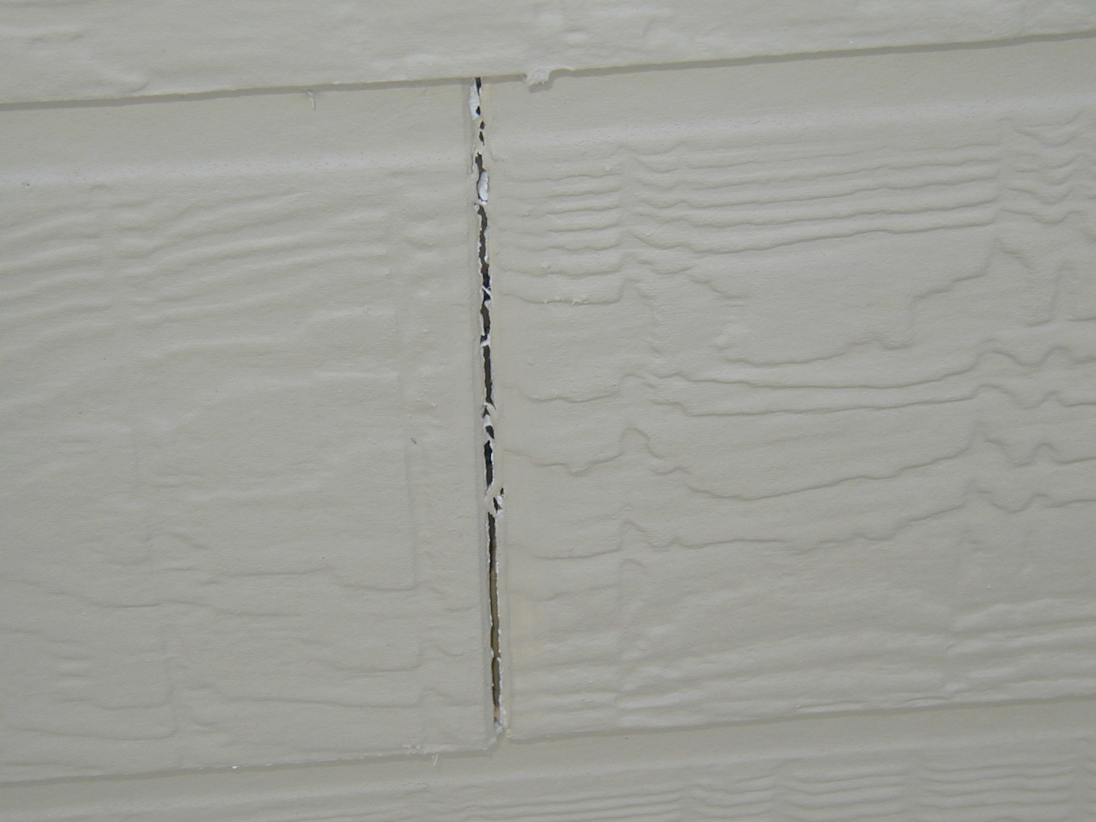 Cracked Siding Repair | Home Handyman | James Allen Builders